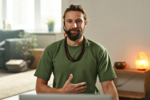 Yoga instructor having lessons online